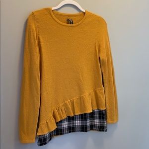 Yellow sweater with plaid underlay